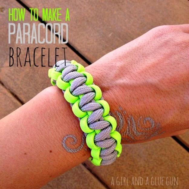 Pin graphic reading How To Make A Paracord Bracelet over a green and lavender woven band worn on a wrist