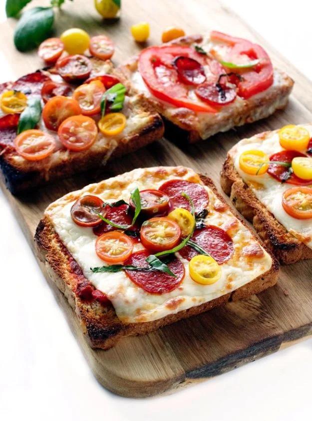 Pizza toast topped with marinara, melted mozzarella, pepperoni and grape tomatoes, a five minute dinner for one
