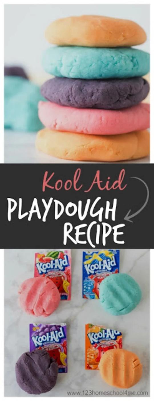 Stack of homemade Kool Aid playdough rounds in pink, blue, purple and orange, beside the drink packets