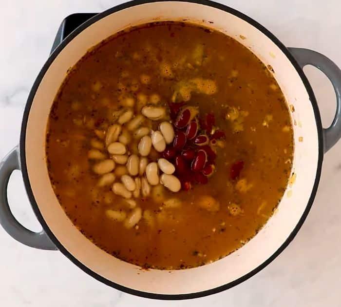 Cooking minestrone soup in a pot
