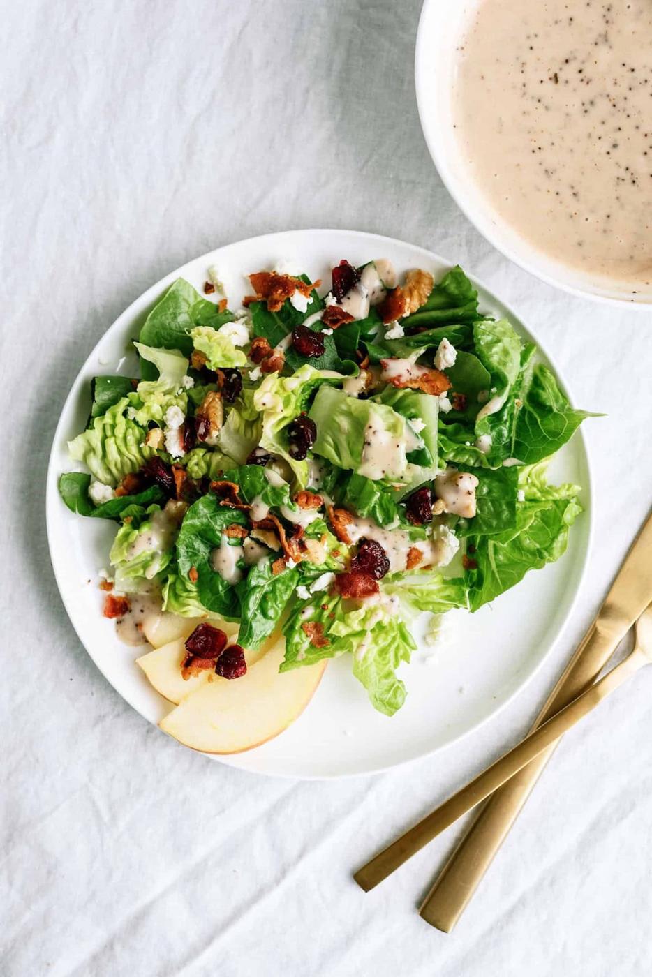 Apple cranberry walnut chopped salad with feta, bacon and chopped romaine, tossed in a poppyseed dressing