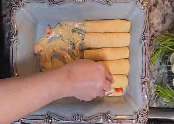 Assembling the marry me enchiladas