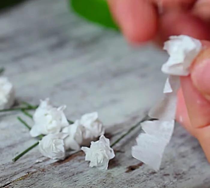 Cut Strips Of Toilet Paper To Make Baby's Breath Flowers