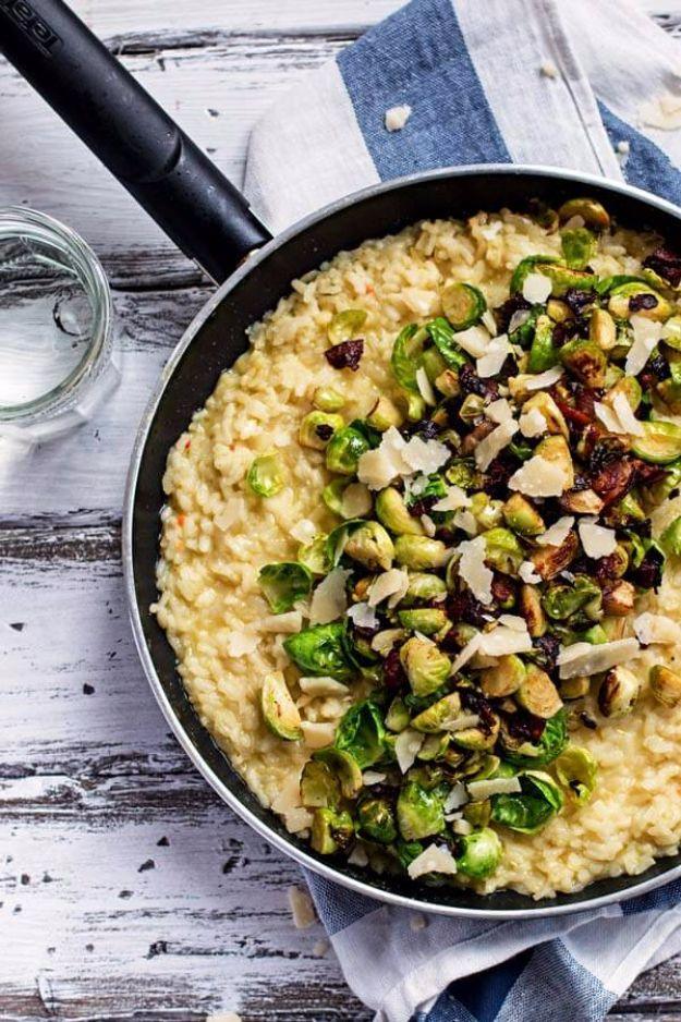Bacon and brussels sprouts risotto in a skillet, browned sprouts and crisp bacon under shaved parmesan