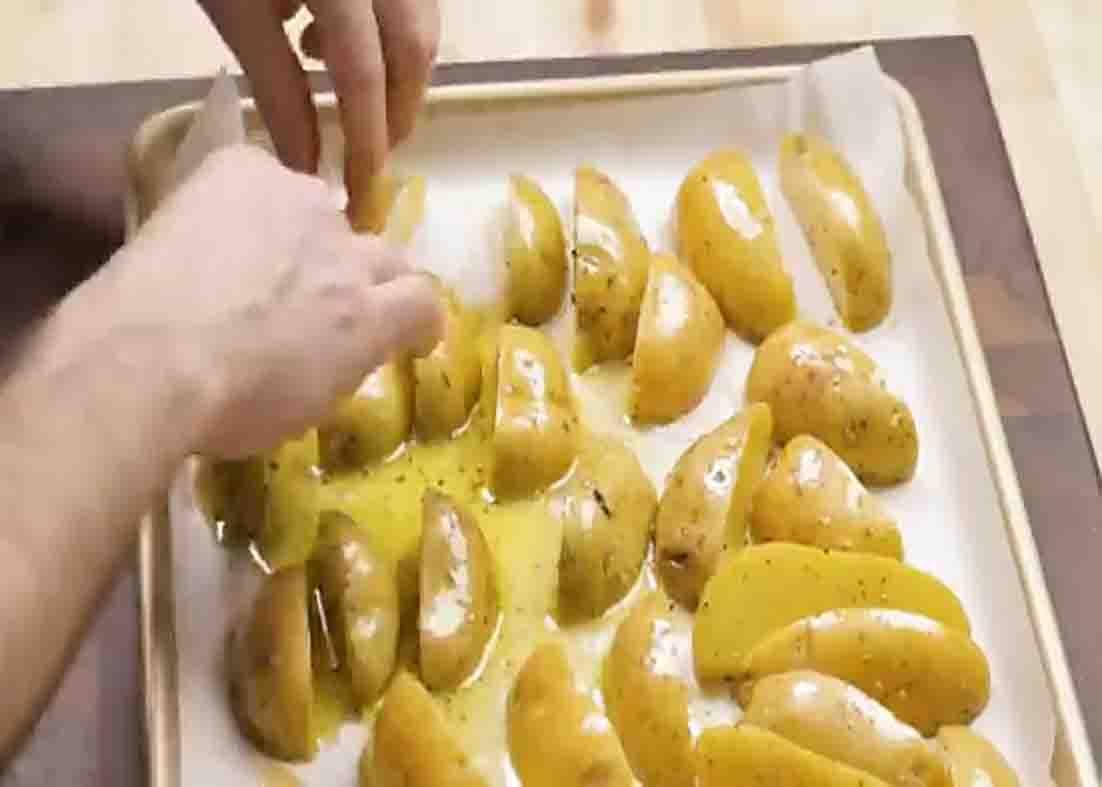 Preparing the potatoes for the chicago-style chicken and potatoes recipe