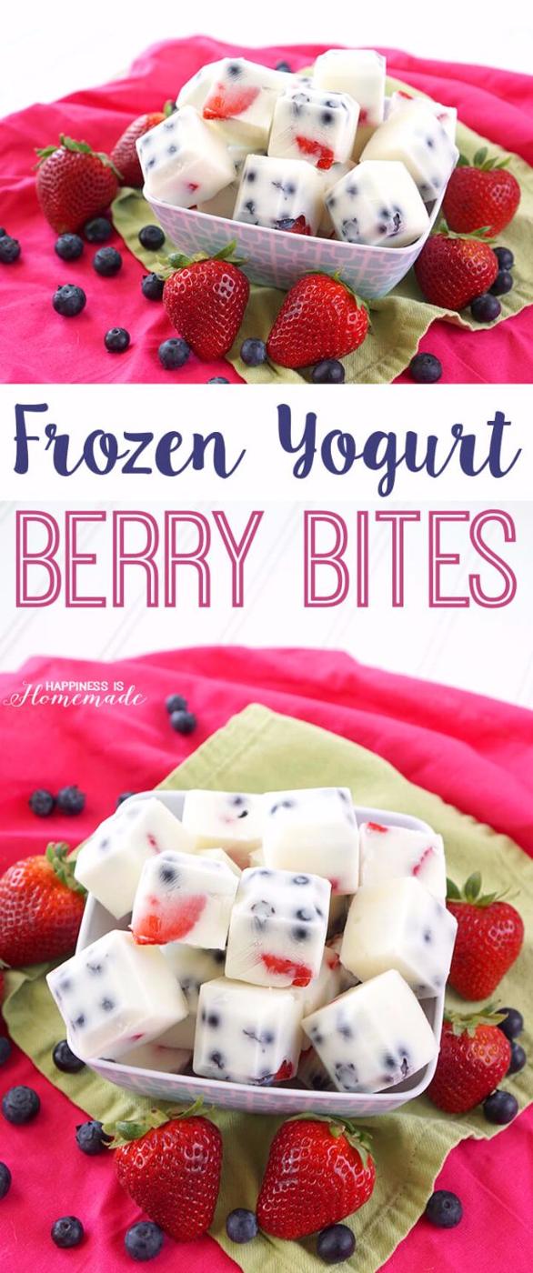 Frozen yogurt berry bites made in a silicone ice cube tray with strawberries and blueberries set in yogurt