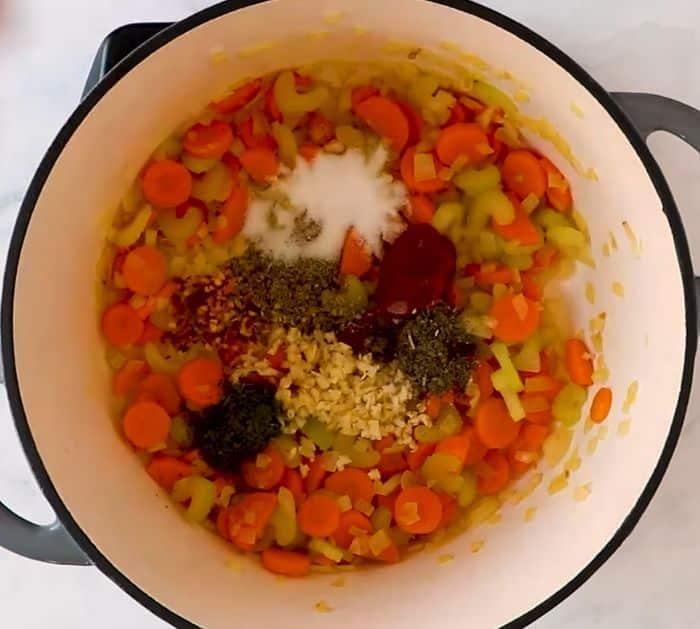 sautéing vegetables in a large pot