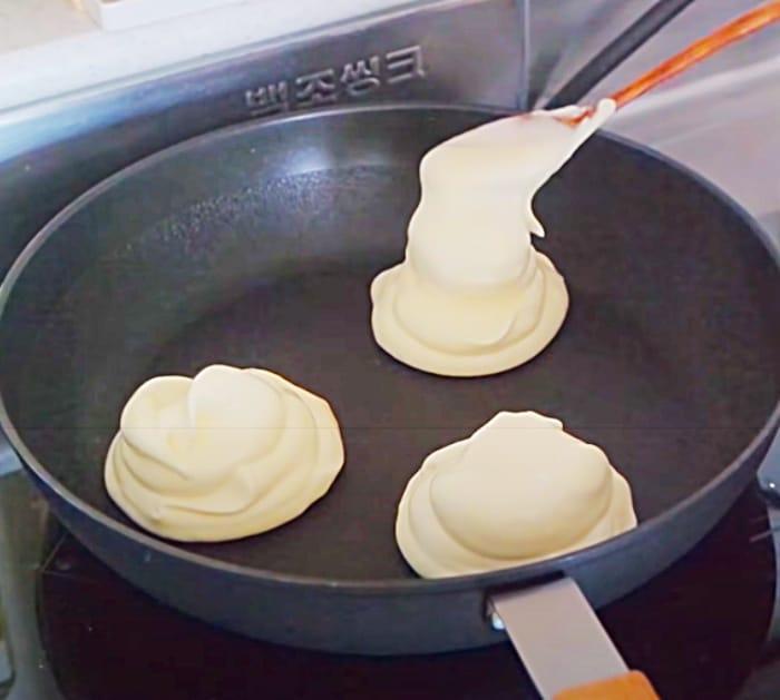 Pour Fluffy Pancake Batter Into A Pan To Make Souffle Pancakes