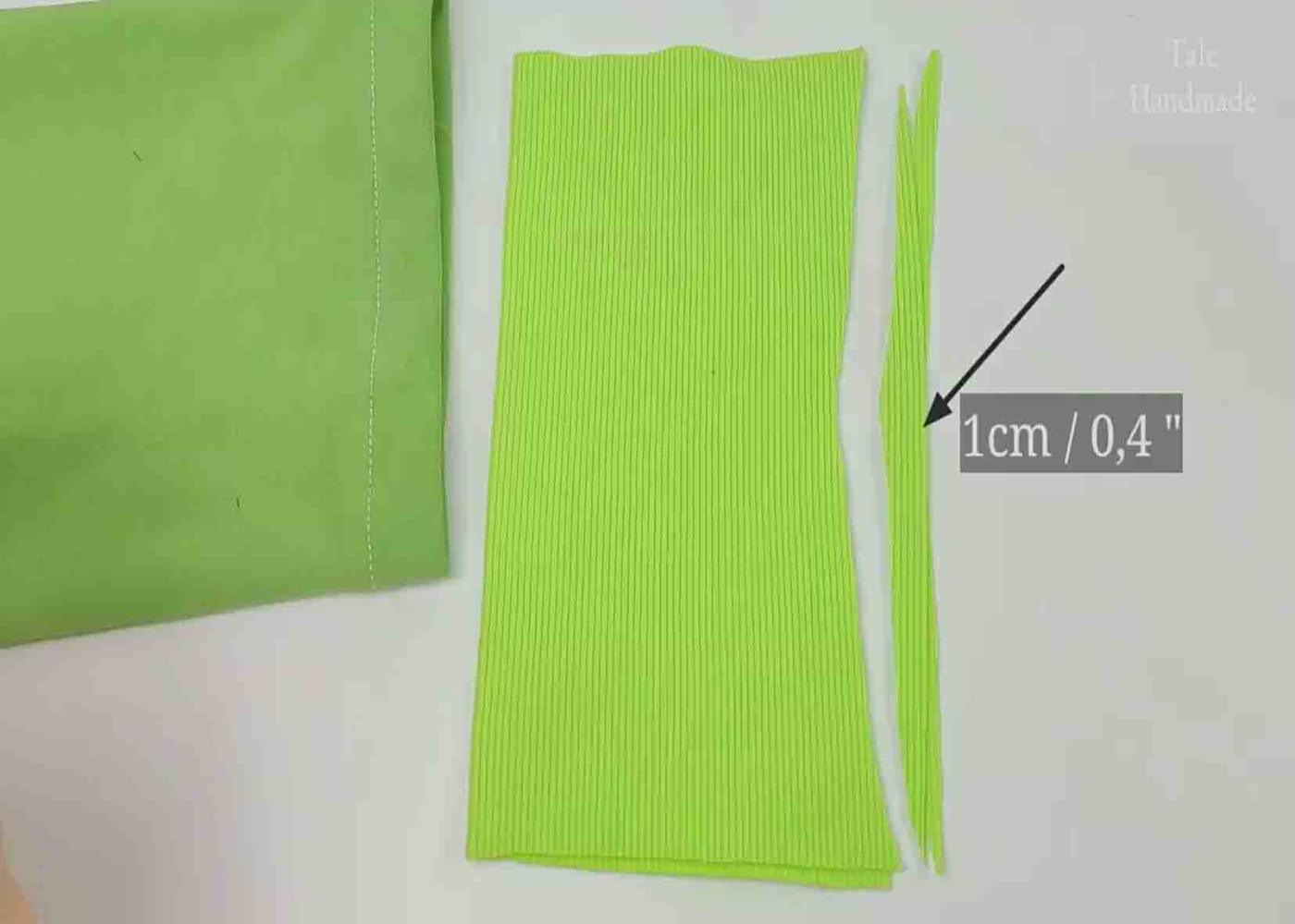 Attaching a cuff fabric to the edge of the sleeve