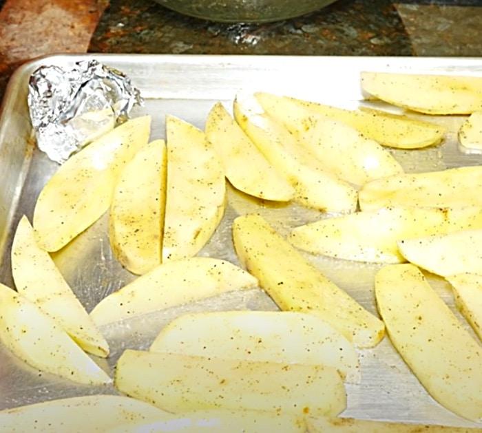 Potato wedges with roasted garlic butter sauce