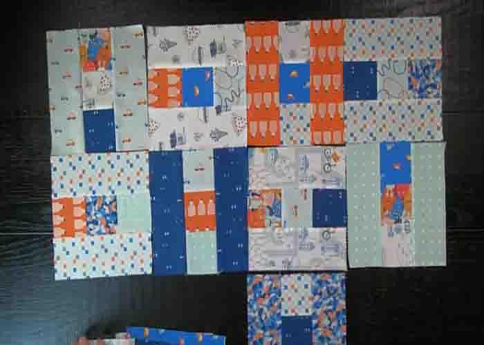 Laying the blocks to make the tower block quilt