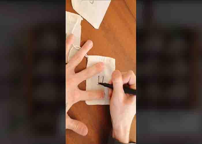 Numbering the muslin bags for the DIY advent calendar