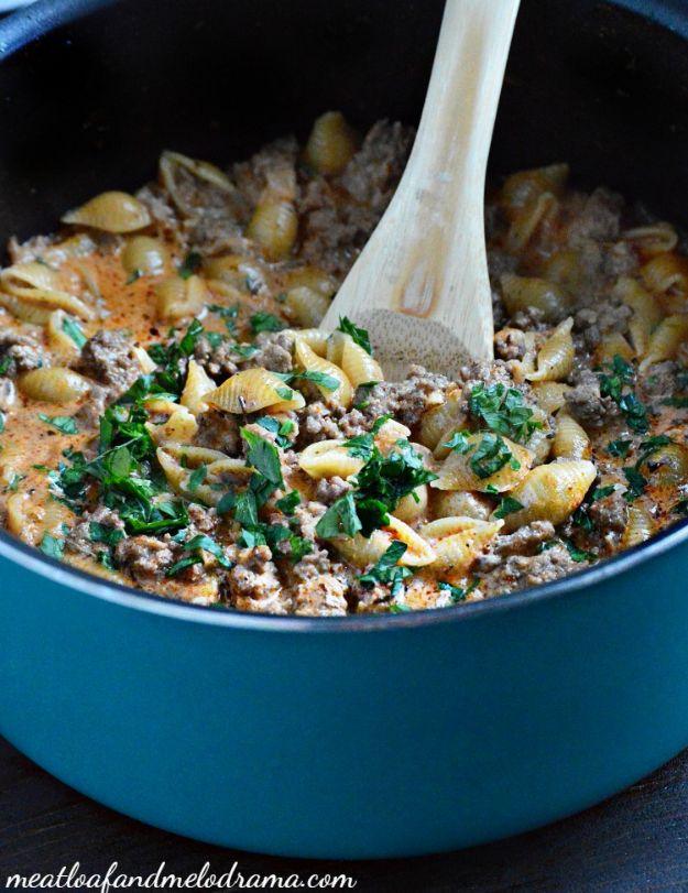 Creamy one pot shells and beef with medium pasta shells in a pink tomato cream sauce and grated parmesan