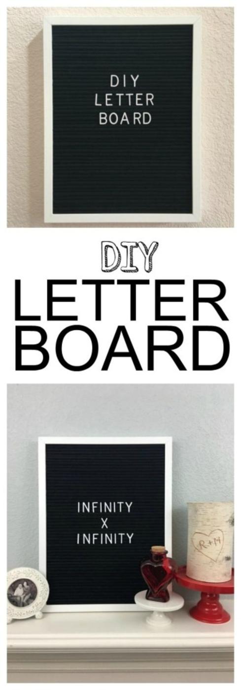 Black felt letter board in a white frame spelling INFINITY X INFINITY on a shelf with a clock and candle