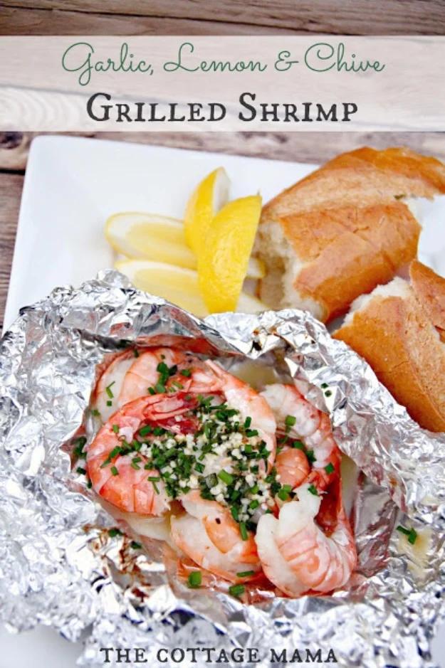 Garlic lemon and chive shrimp grilled in a foil packet for one of the best parts of a summer cookout
