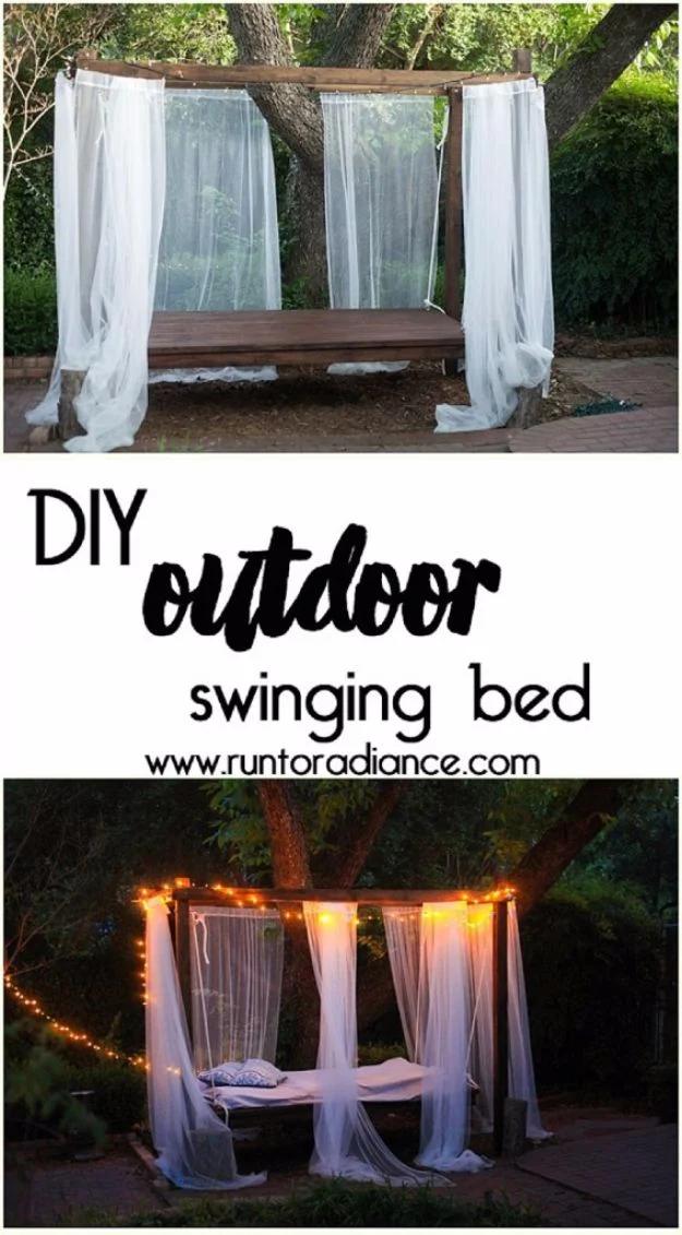 DIY Outdoor Swinging Bed, gentle on the wallet even making a matching pair and a touch that upgrades a plain corner instantly