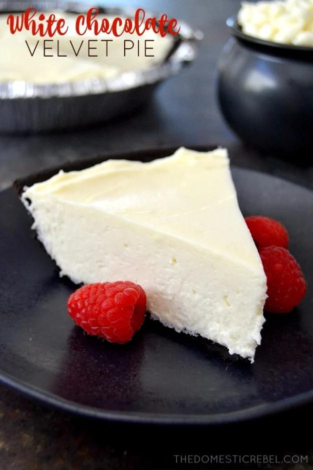 White chocolate velvet pie with a dark Oreo cookie crust and a smooth pale no bake white chocolate filling