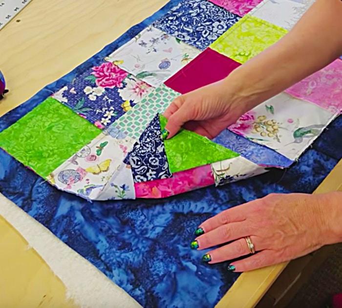 Learn to sew this DIY no pattern prairie point table runner.