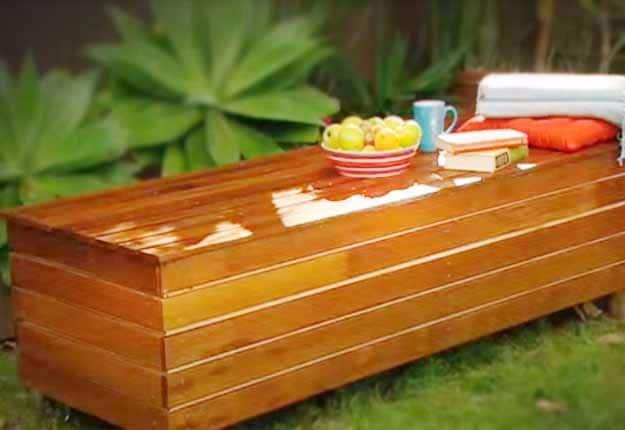 DIY Outdoor Storage Bench Tutorial, a creative touch for a porch or garden path and a pretty accent piece for any garden bed