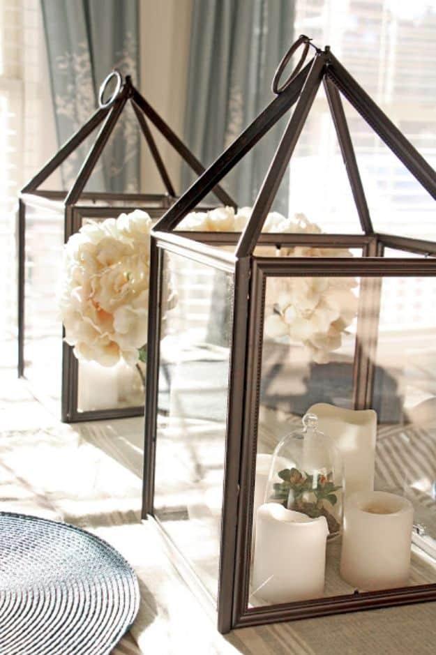 DIY Hurricane Lanterns, a popular choice on this list and an easy budget living room decor idea worth saving for later