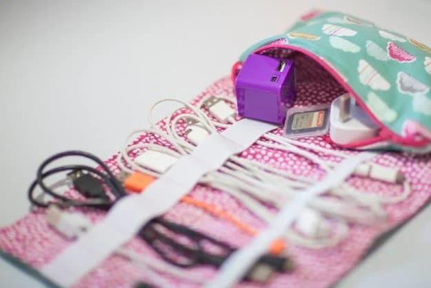 Sewing craft to sell: a fabric cable cosy sewn to keep charging cords tidy and tangle free on any desk