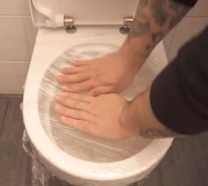 Easy Trick to Unclog Your Toilet With Cling Wrap Tip