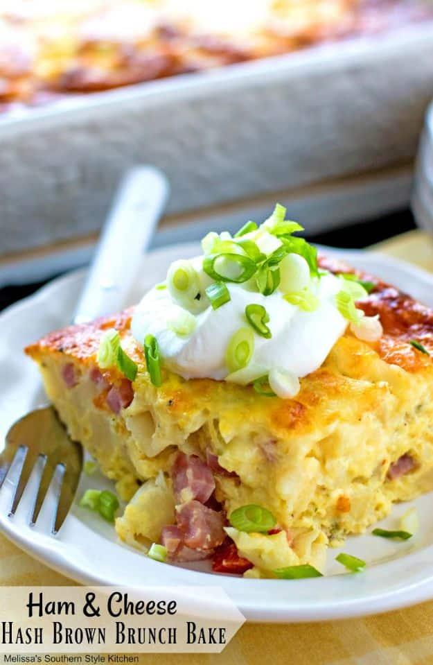 Ham and cheese hash brown brunch bake in a 9x13 dish, layered with ham, pepper jack and a set egg custard