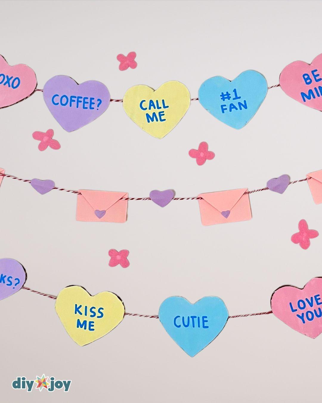Easy Cardboard Conversation Hearts Valentines Decor — conversation heart photo backdrop