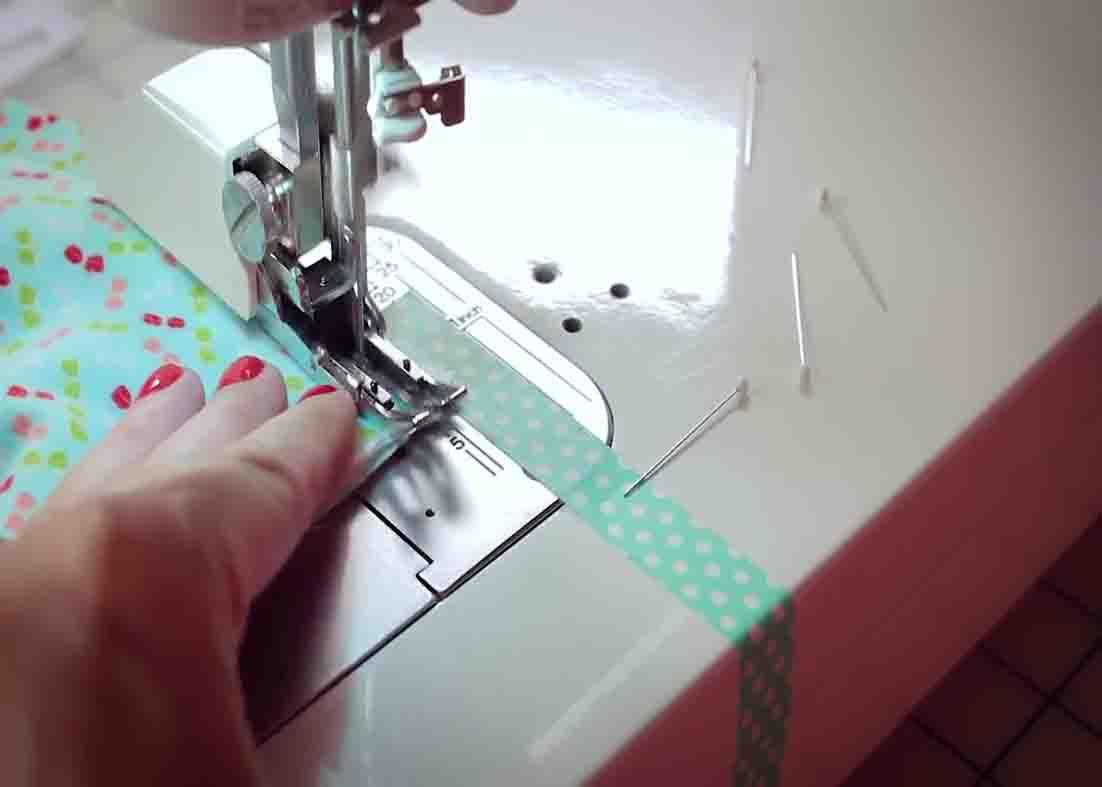 Sewing the strips to make the flannel rag quilt