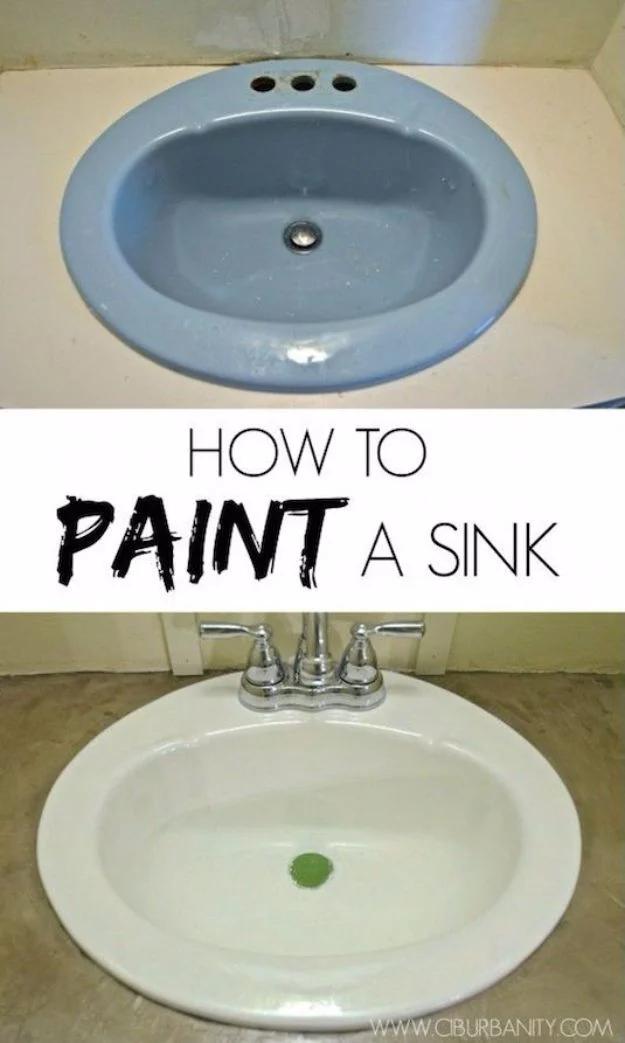 Paint an old sink, a dated pale blue oval bathroom sink above the same sink painted glossy white with a chrome faucet fitted