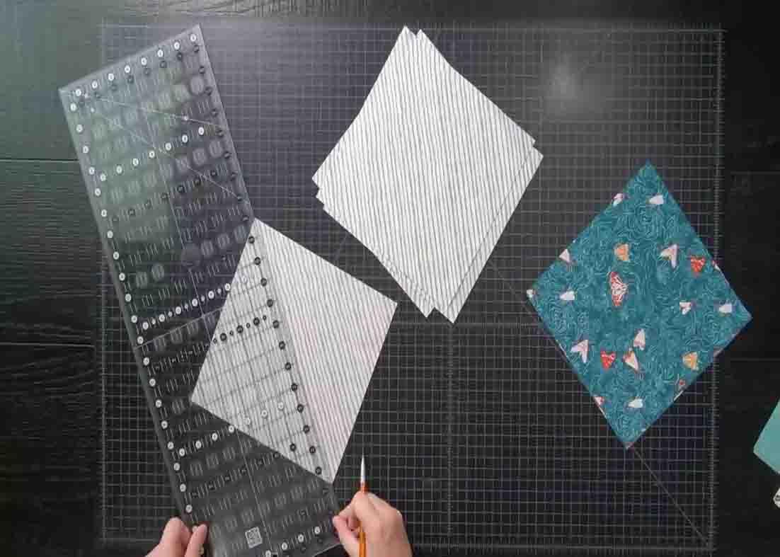 Cutting the fat quarters to make the love letter's quilt