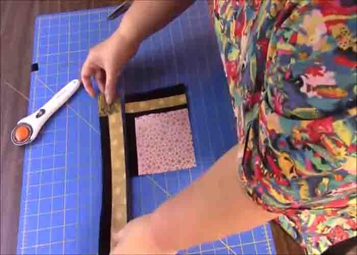 Attaching the strip set to the edges of the 5" square