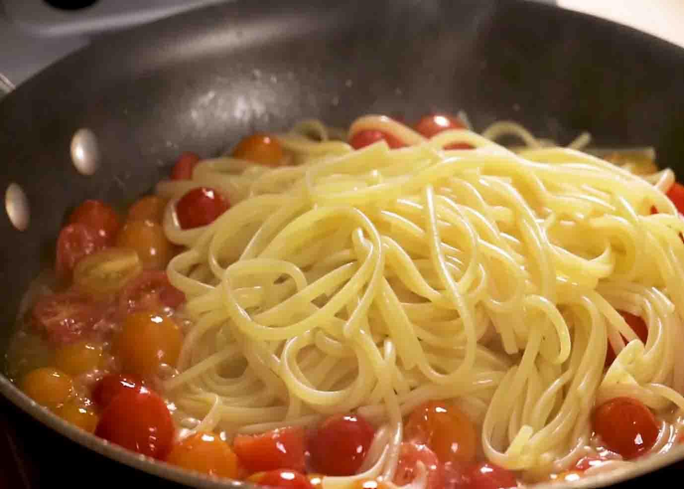 Cooking the garlic and cherry tomato pasta
