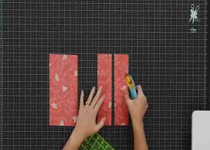 Cutting the 10" square for the squared up quilt