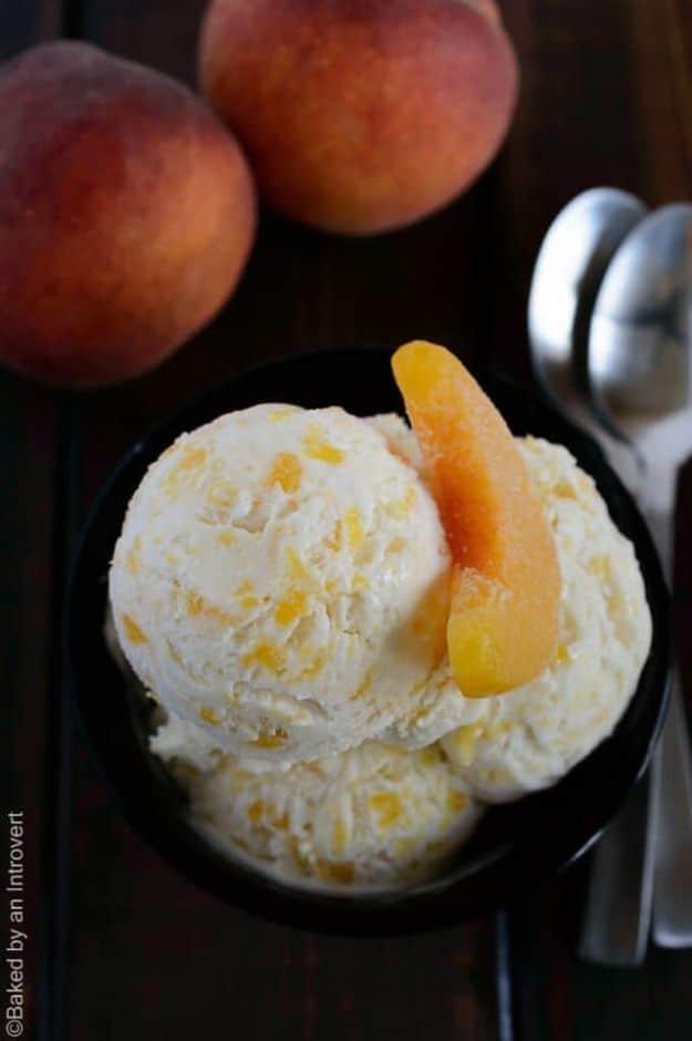 Peaches and cream ice cream swirled with peach jam in a loaf pan, a no churn summer frozen dessert recipe