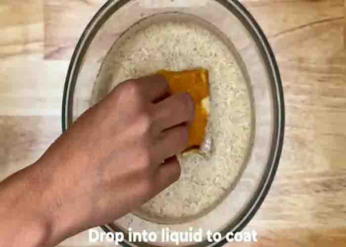 Coating the Hawaiian rolls with the milk mixture