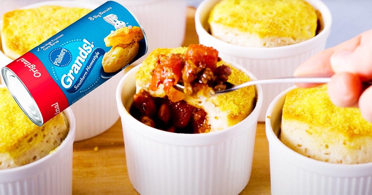 Mini chili pot pies in ramekins topped with canned biscuits brushed with honey butter and cornmeal recipe worth making twice