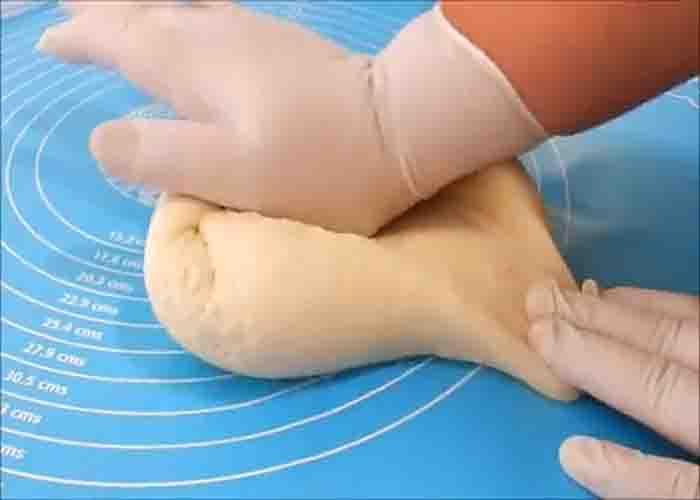 Kneading the dough for the potato pide