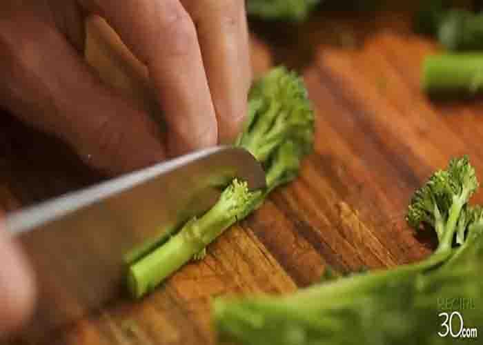 Chopping the broccolini for the pasta recipe