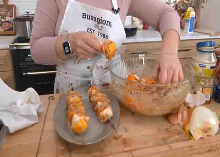 Adding the chicken and bell pepper into the skewers