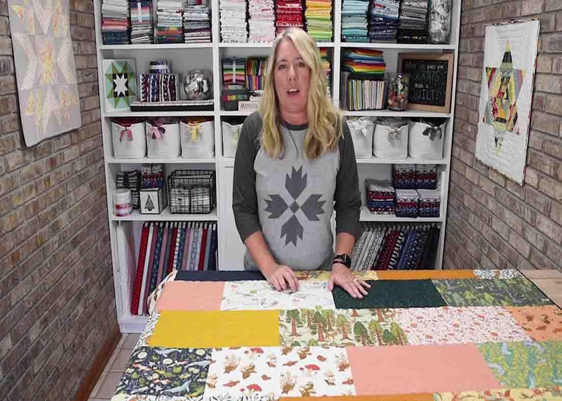 Sewing the bricks together to form the brick house quilt