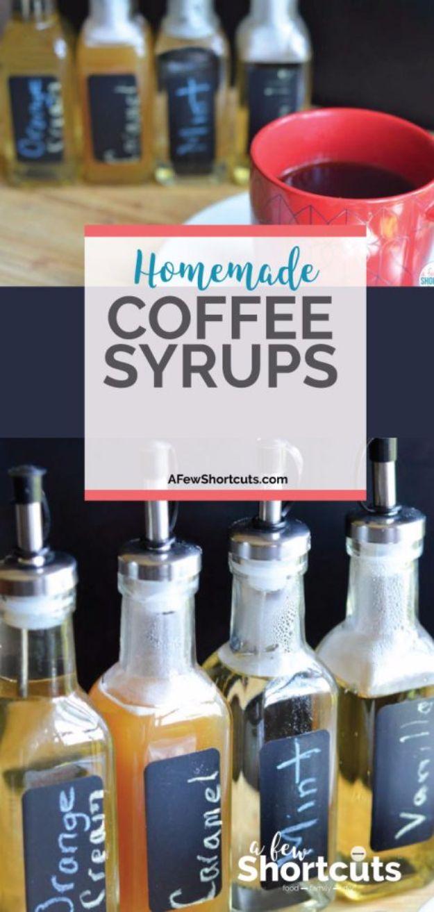 Homemade coffee syrups, a row of glass bottles with chalkboard labels holding golden flavored coffee syrups