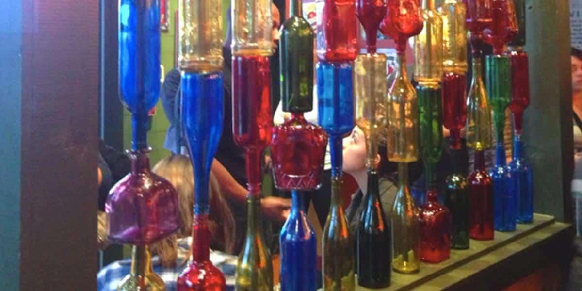 Stunning DIY Bottle Wall Can Be Yours In Only A Few Hours…