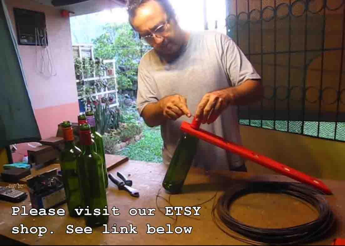 Attaching the wine bottles to the wooden board