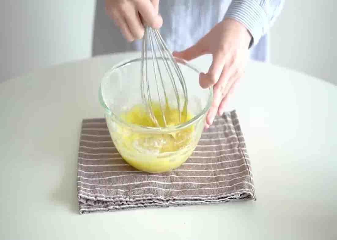 Beating the egg yolks for the pancake recipe