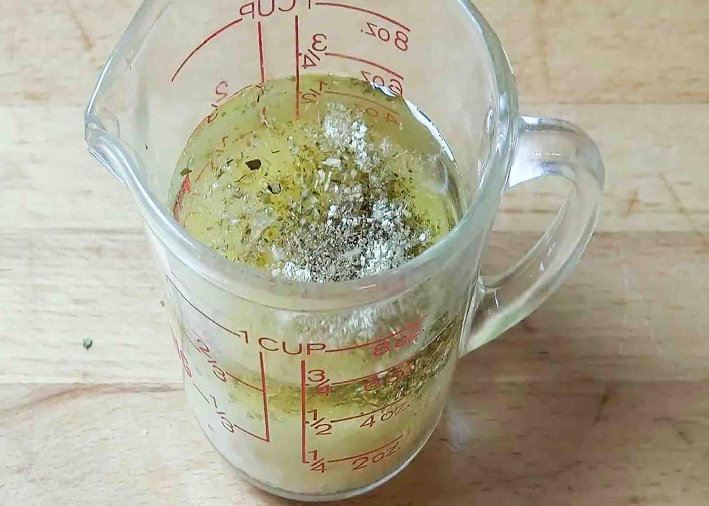 Mixing all the marinade that will go to the slow cooker for the chicken