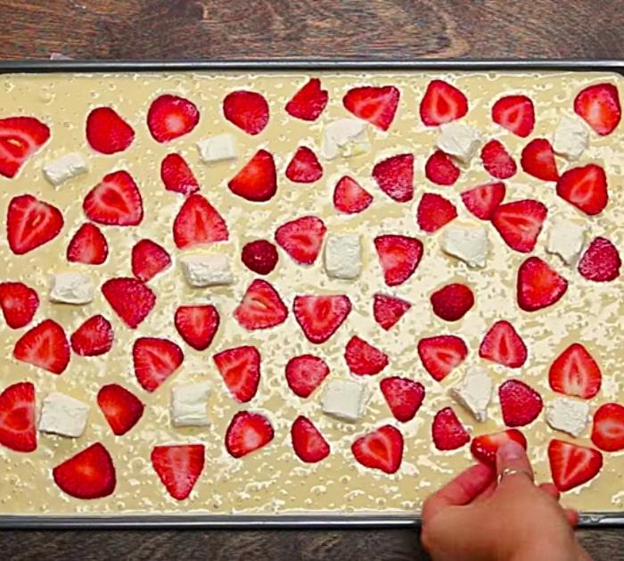 Make sheet pan pancakes with strawberries and bananas