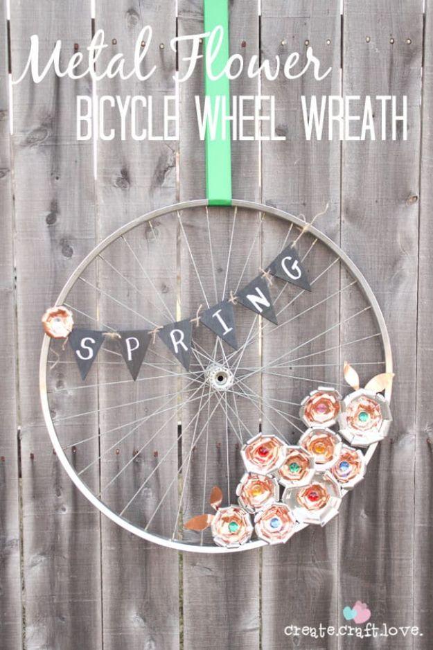 Bicycle wheel wreath with copper and aluminum metal flowers and a spring banner on barn wood, a beginner craft