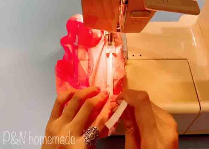 Sewing the elastic band onto the fabric cover