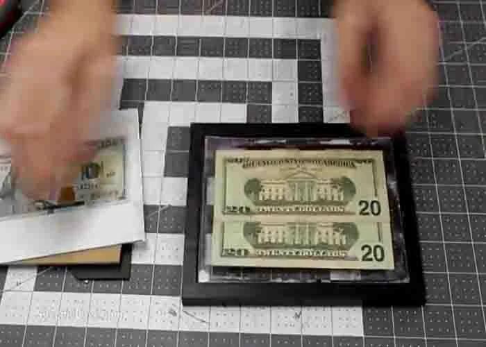 Framing money in picture frames before gifting them